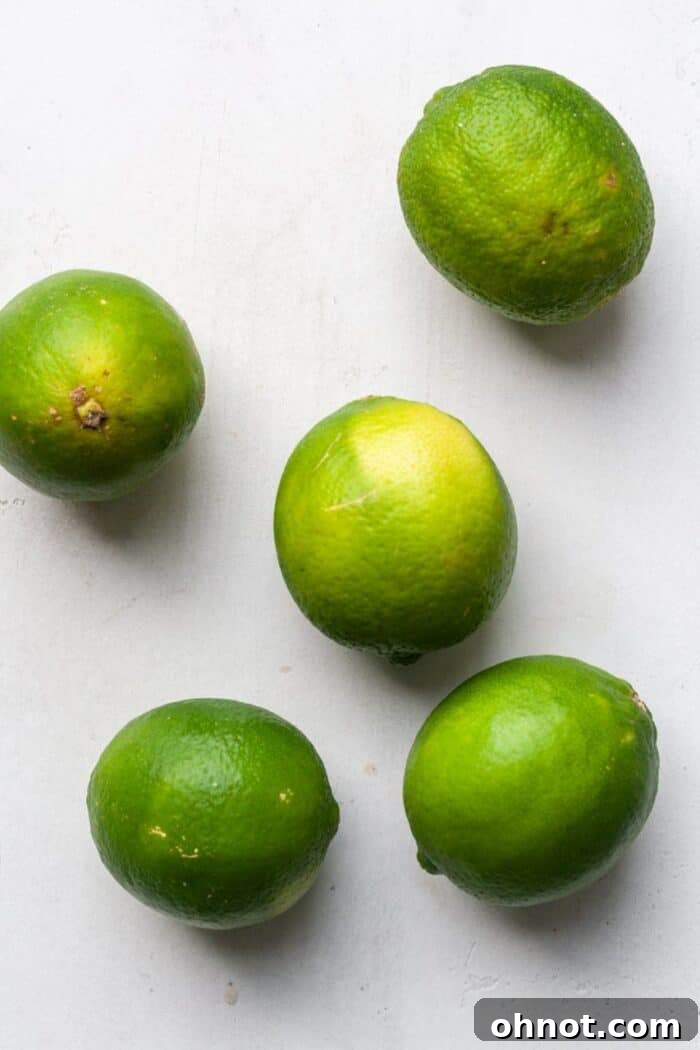 A pile of fresh, green limes.
