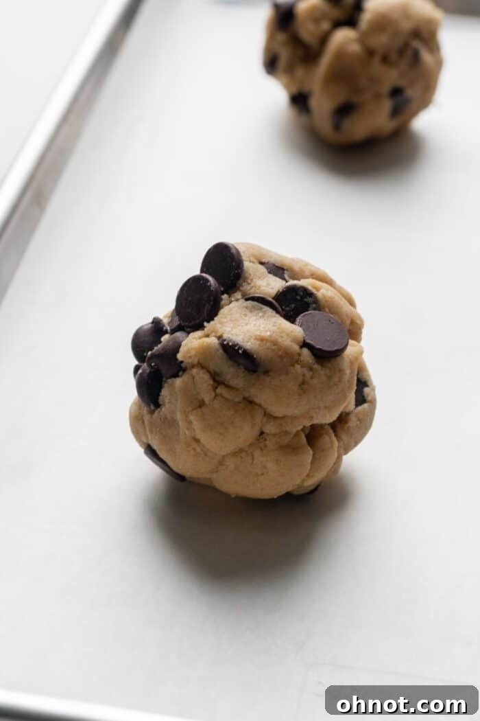 Jumbo chocolate chip cookies on pan