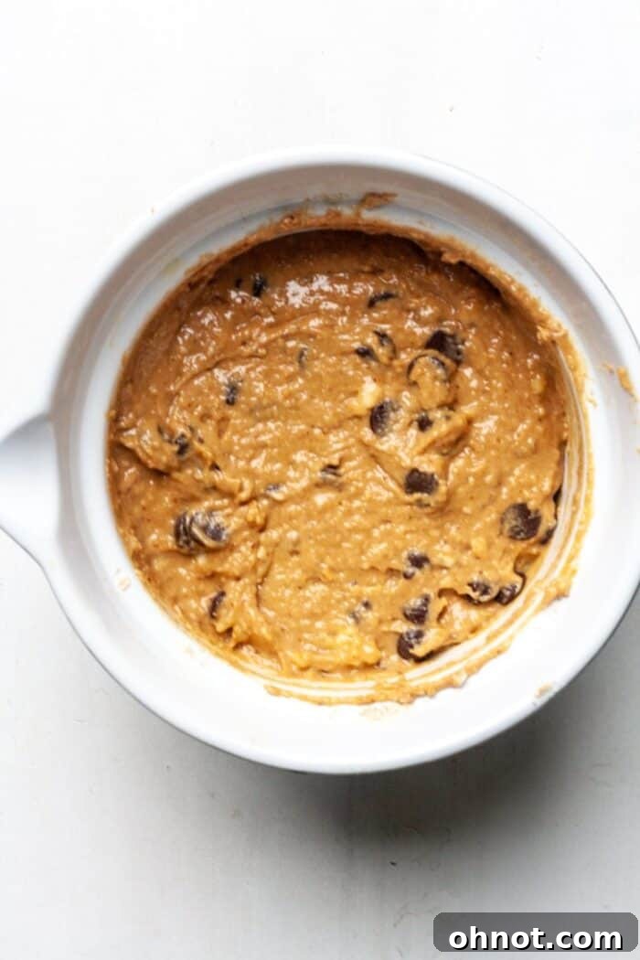 Peanut butter muffin batter with chocolate chips folded in.