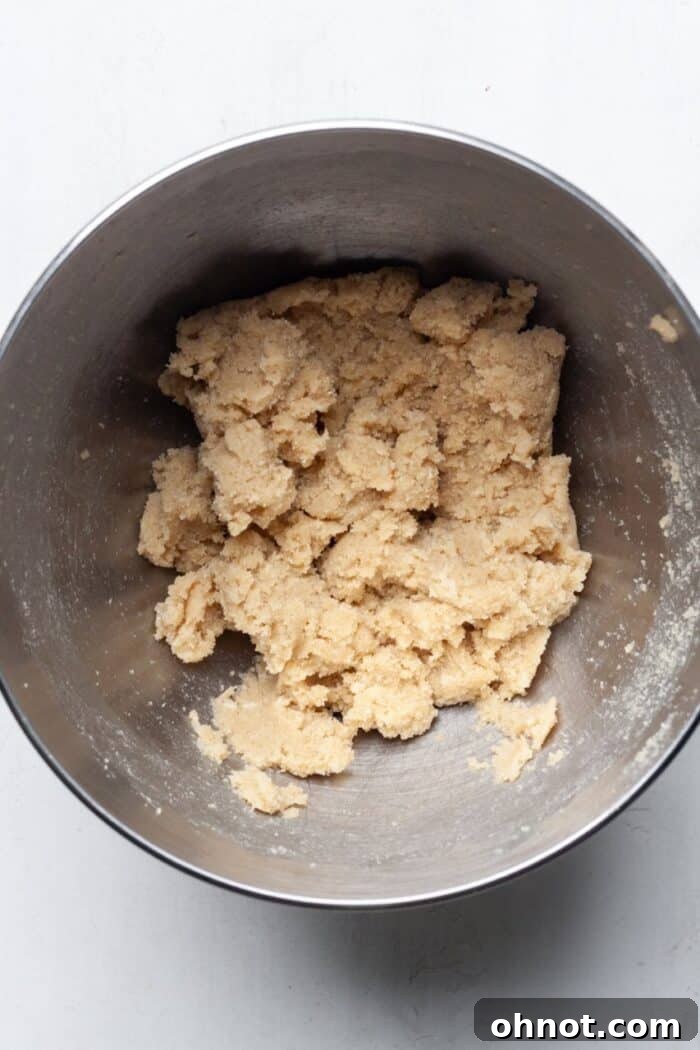 Creamed butter and sugar mixture in a mixing bowl