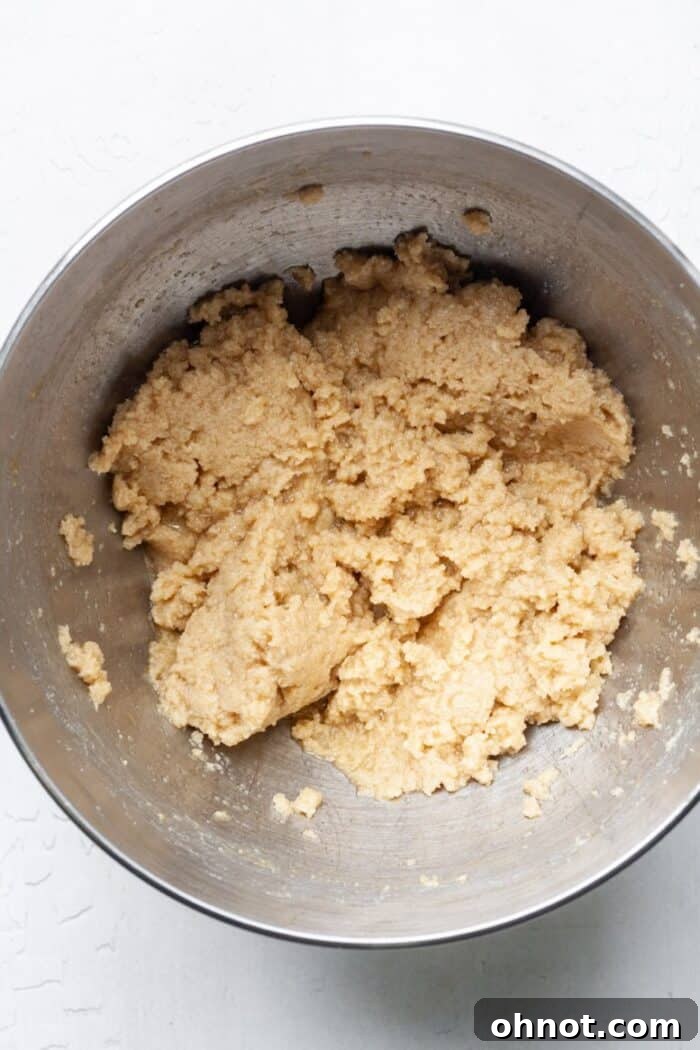 Smooth, creamy cookie dough mixture after eggs and vanilla have been incorporated.