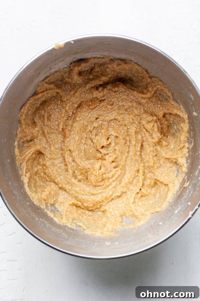 Creamy, fully combined peanut butter cookie dough in the mixing bowl.
