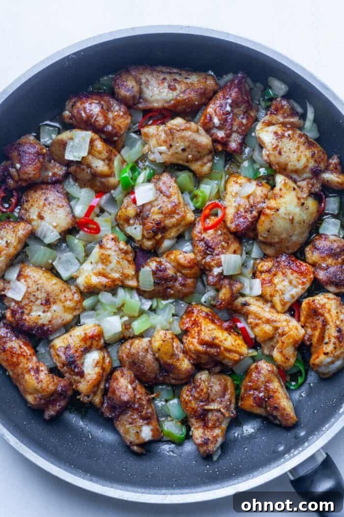 Salt and pepper chicken in skillet