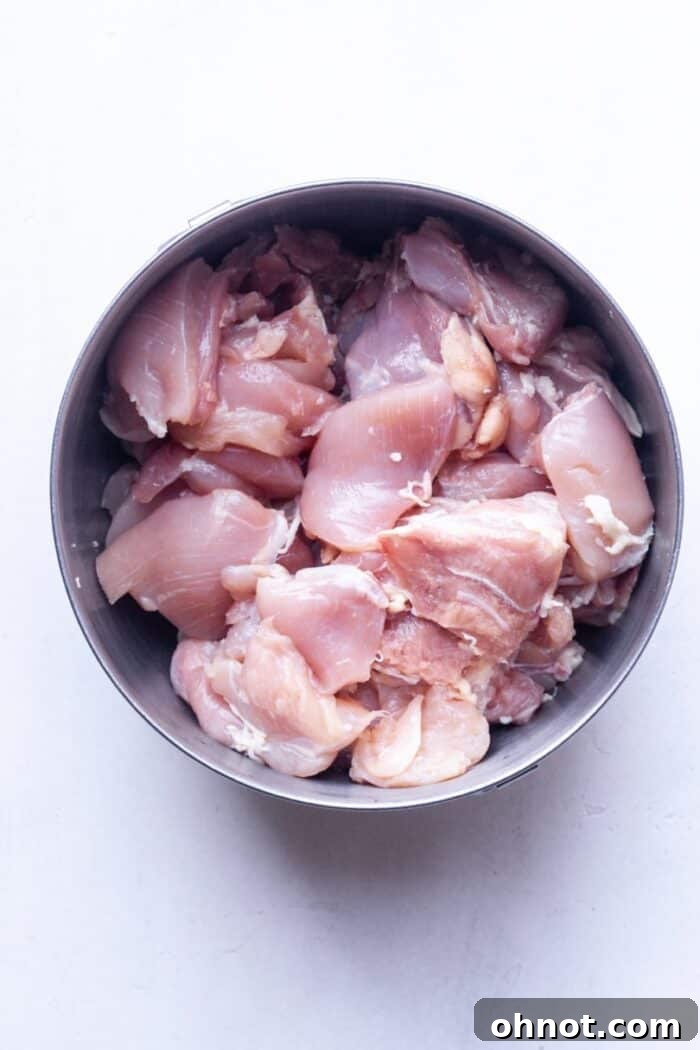 Diced chicken thighs in bowl