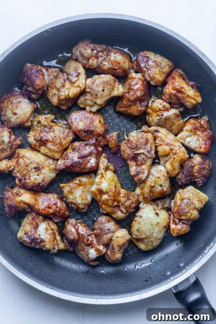 Golden brown chicken in skillet