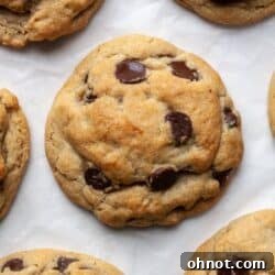 Eggless chocolate chip cookies on parchment paper