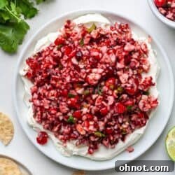Cranberry jalapeno dip on white plate