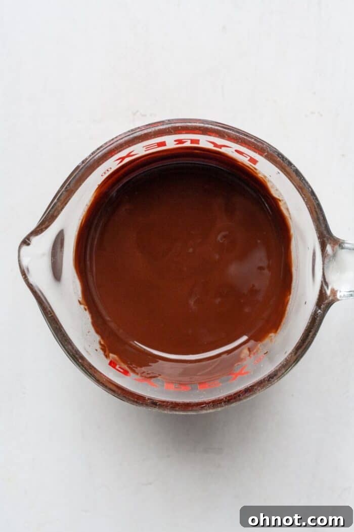 Melted chocolate in glass cup