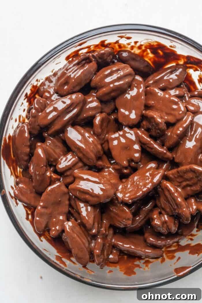 Chocolate and pecans in bowl