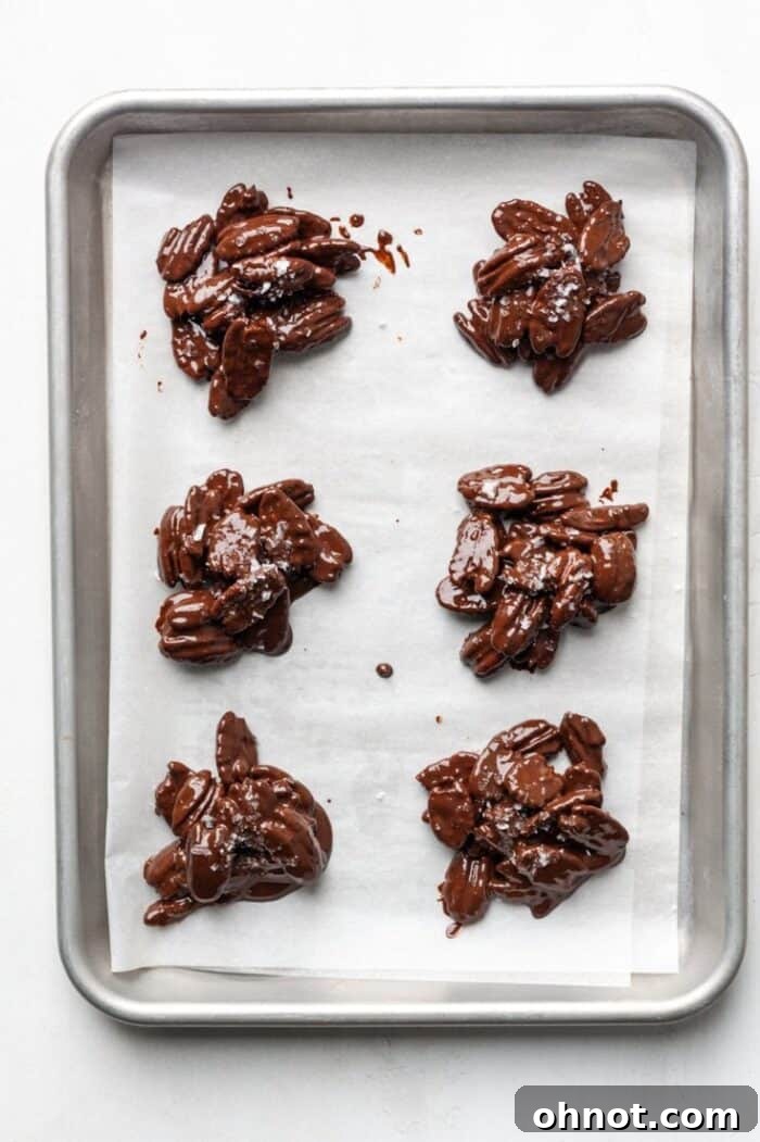 Clumps of pecans on pan