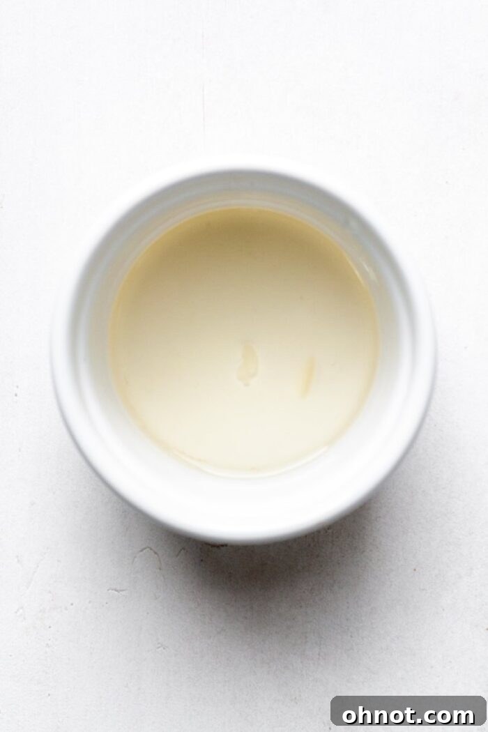 Melted coconut oil in bowl