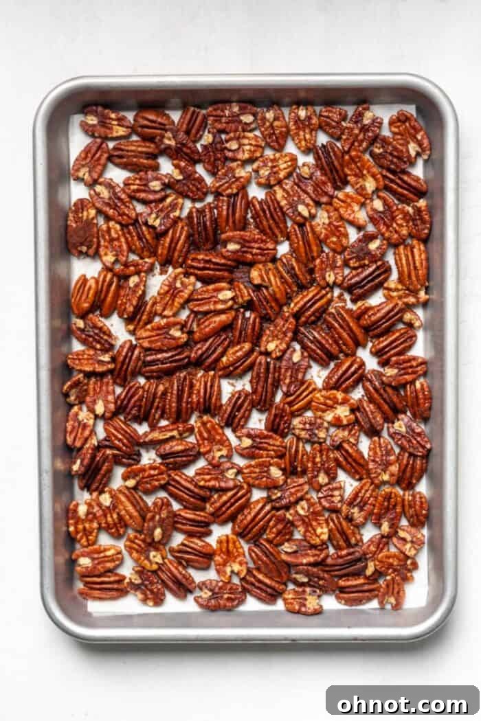Roasted pecans on pan
