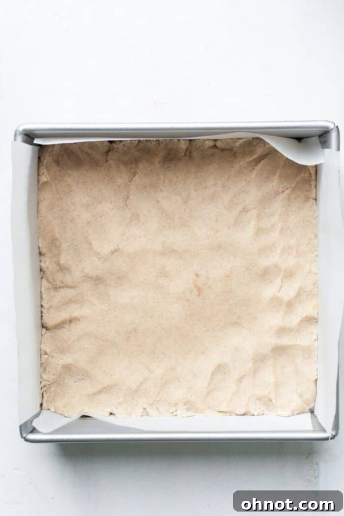 Even layer of shortbread crust pressed into pan