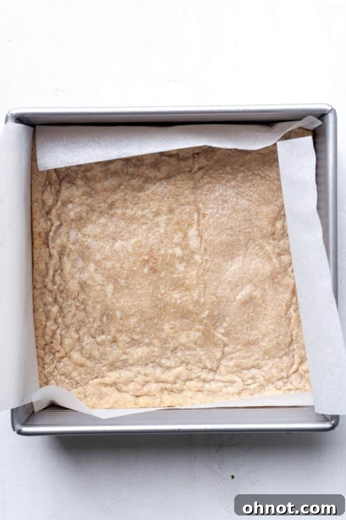 Lightly baked shortbread crust in pan