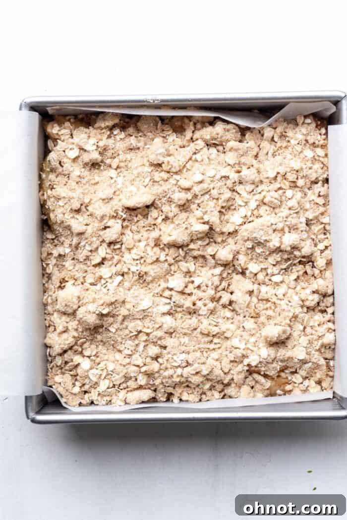 Apple bars with crumble topping evenly distributed