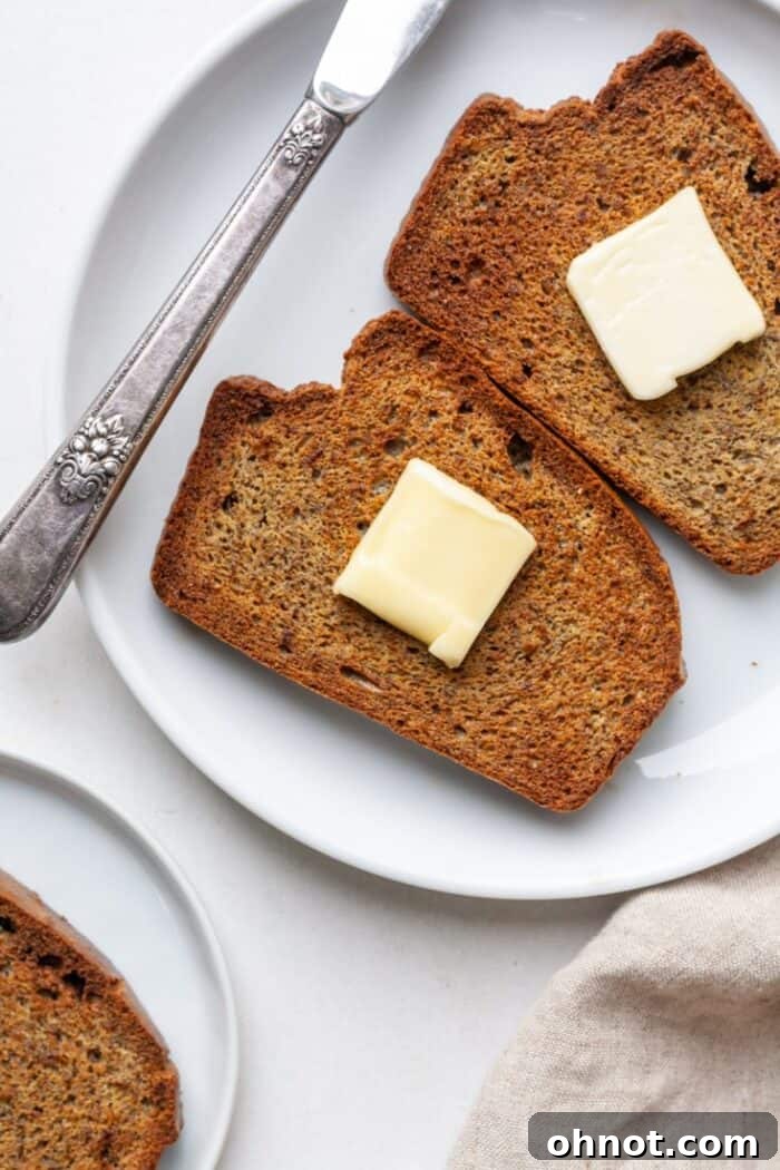Air fryer toast on plate with butter