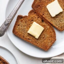 Air fryer toast on plate with butter