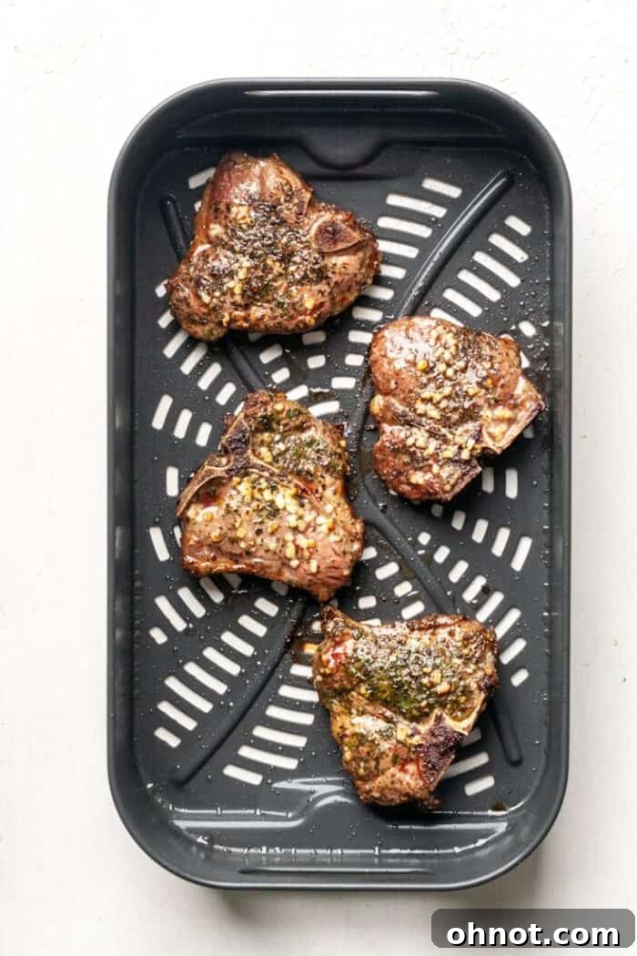 Air fried lamb chops in the basket, perfectly cooked