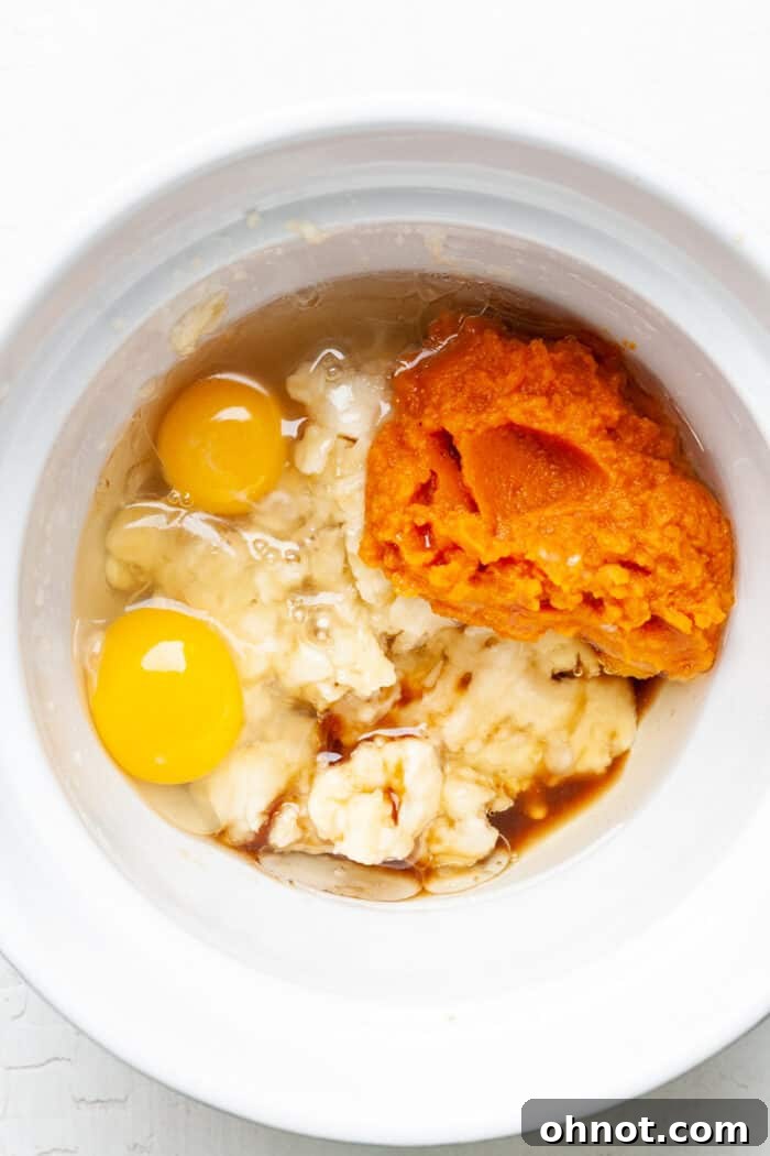 Pumpkin, banana and eggs in bowl