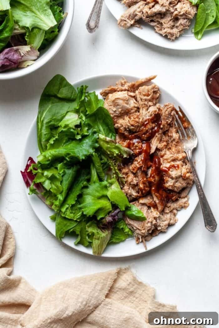 Paleo compliant pulled pork mixed with BBQ sauce in an Instant Pot