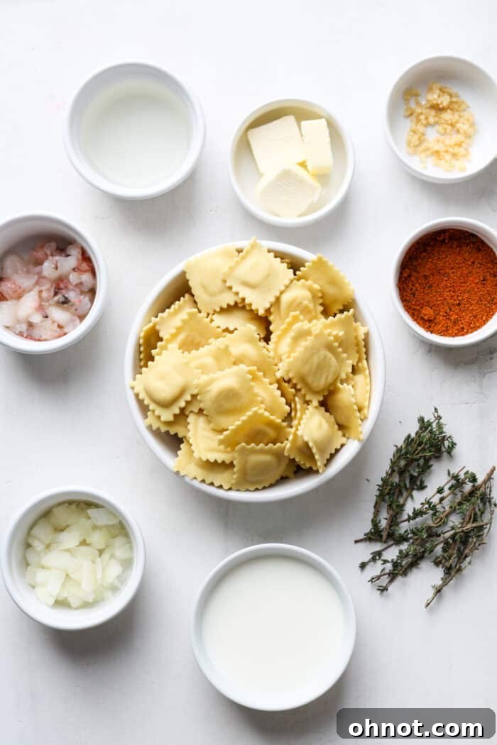 Assortment of fresh ingredients for lobster ravioli sauce, including butter, thyme, onion, and lobster meat.