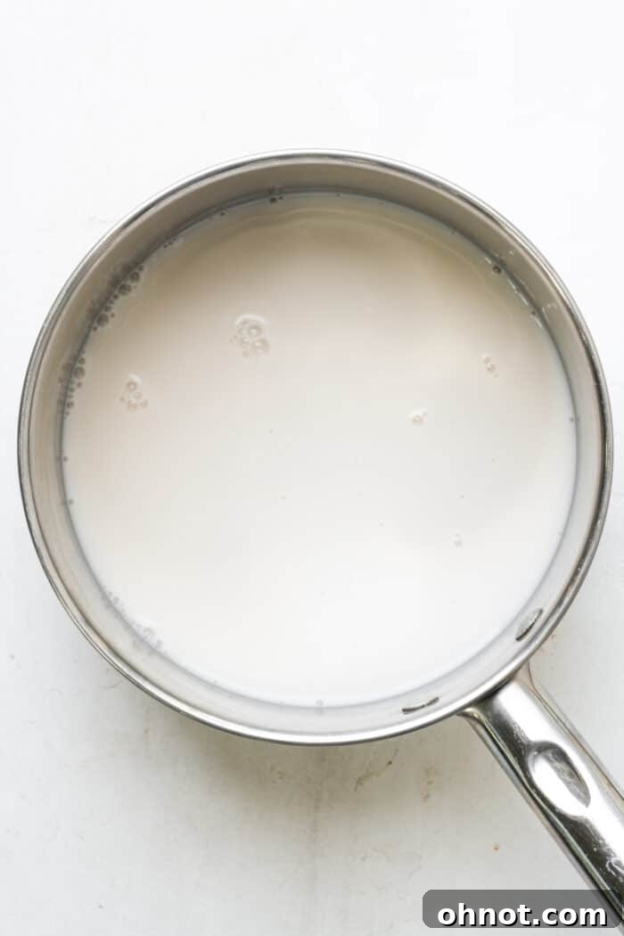 Almond milk in saucepan