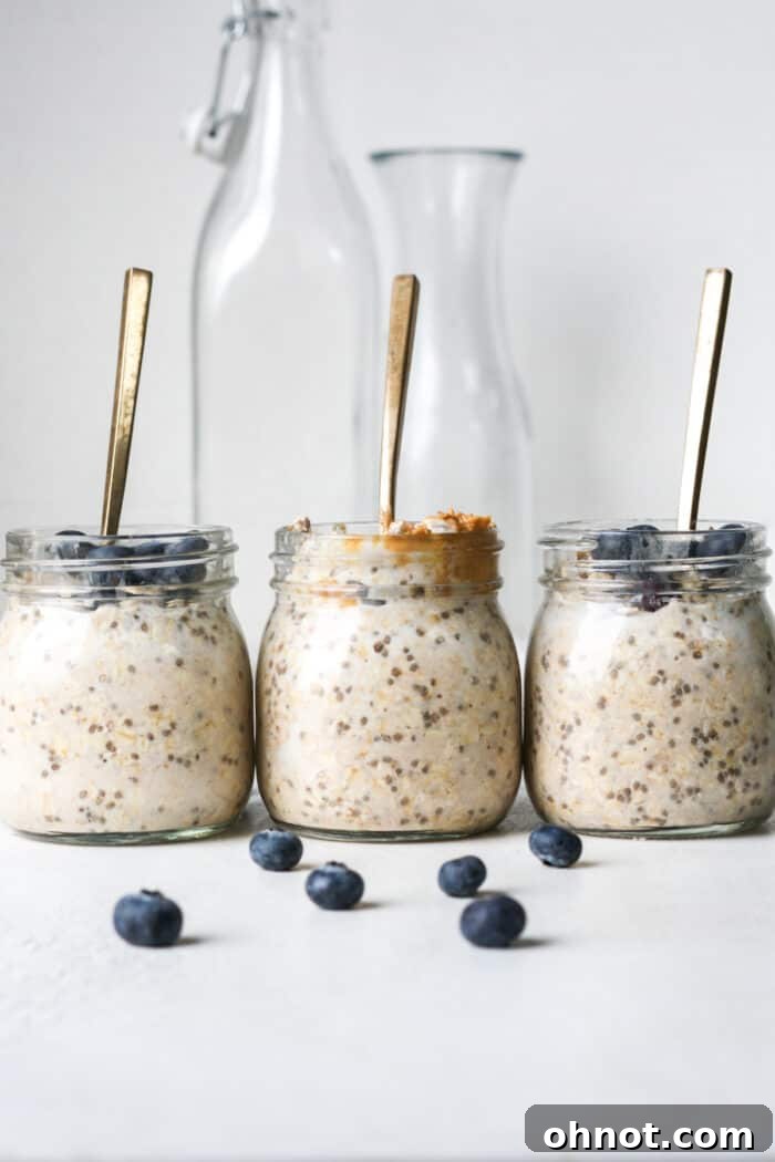 Protein overnight oats in jars with spoons