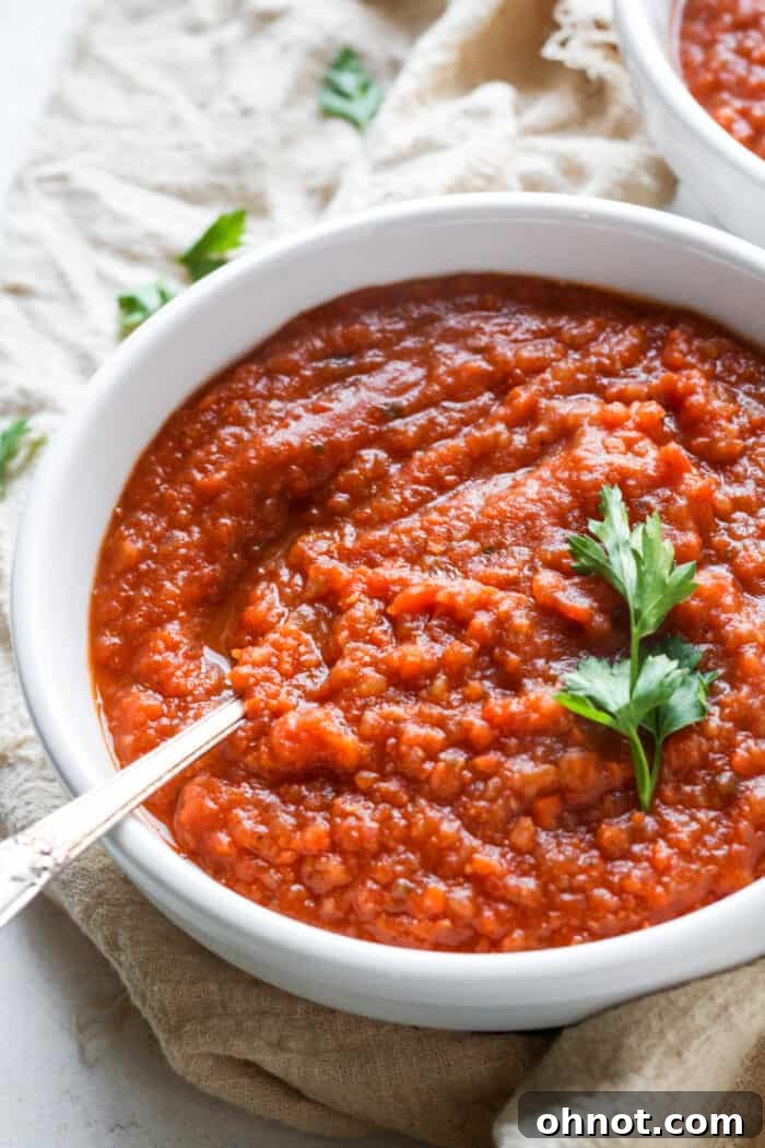 A beautifully presented bowl of gluten-free tomato soup, ready to be enjoyed.