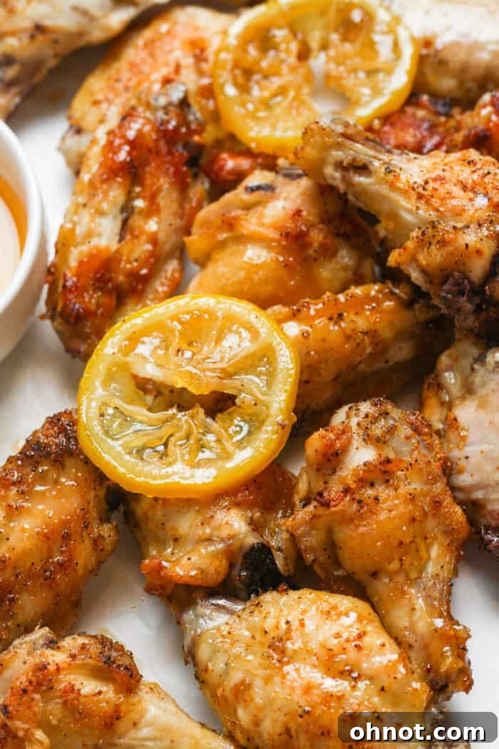 Honey lemon pepper wings on parchment paper