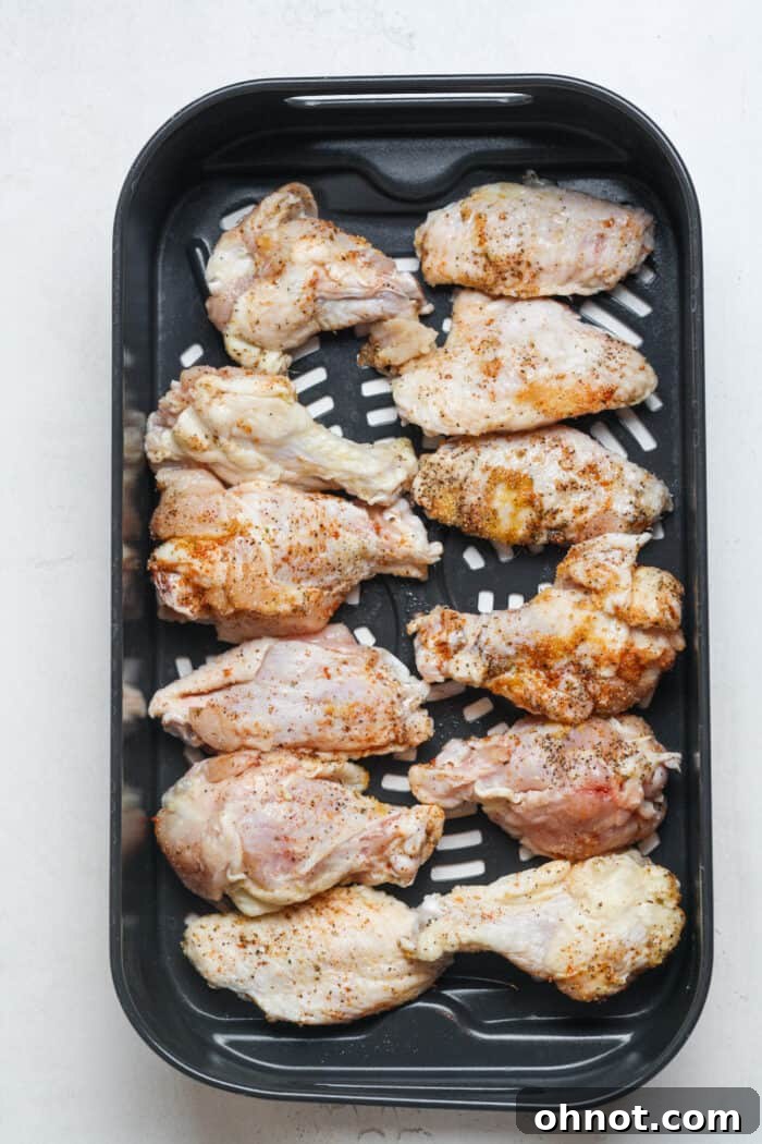 Chicken wings in air fryer basket