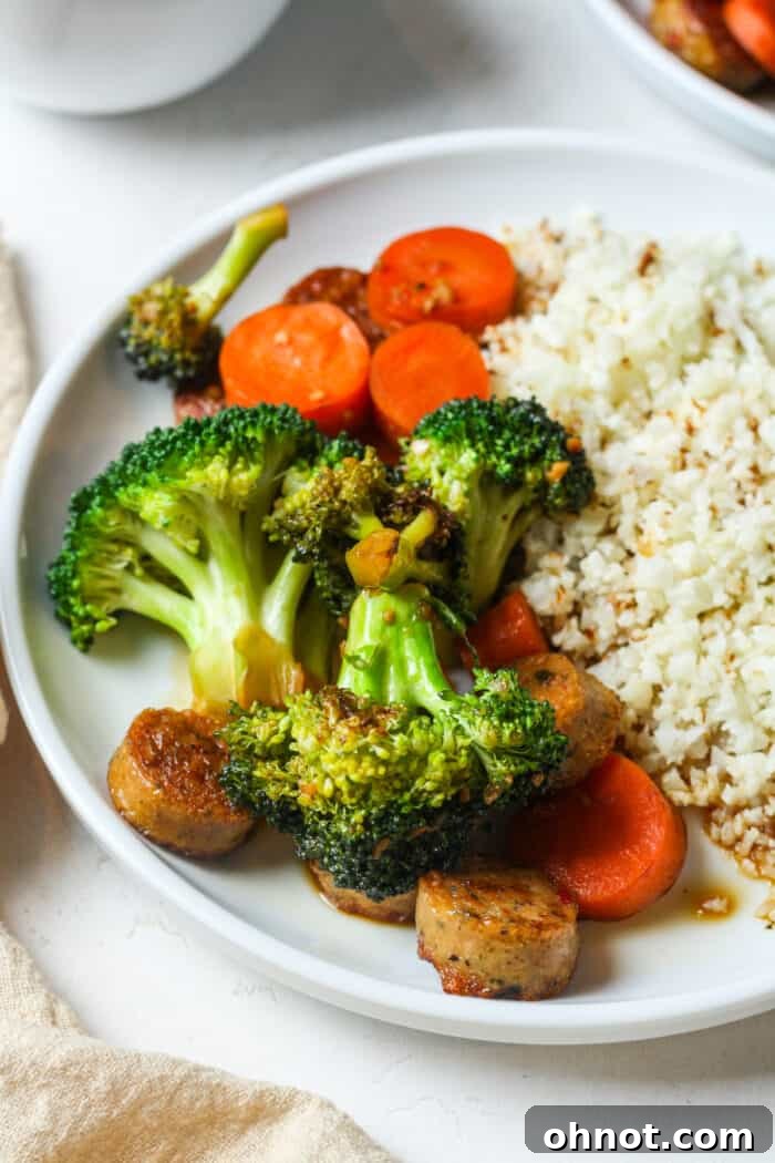 Healthy sausage stir fry plated beautifully, ready to eat