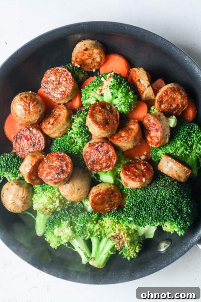 Sausage and vegetables combined in the stir fry pan