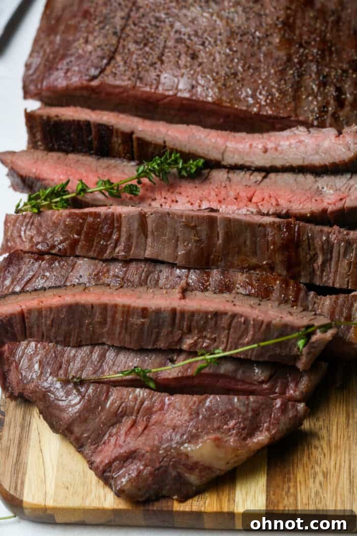 Sous vide flank steak on cutting board