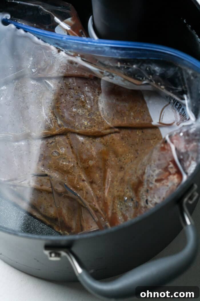 Cooked beef in water bath