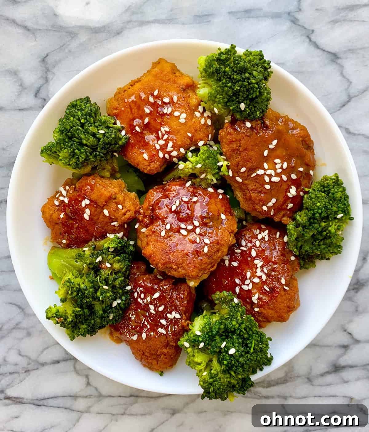 Delicious Teriyaki Turkey Meatballs cooked in an Instant Pot, garnished with sesame seeds.