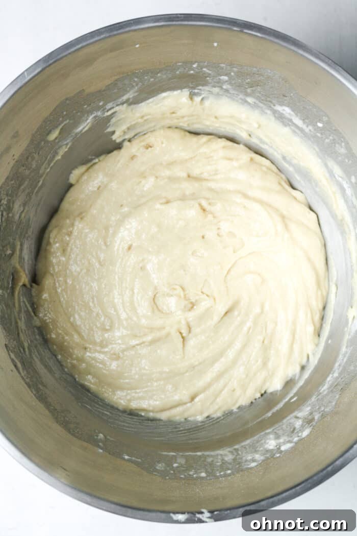 Thick and smooth muffin batter in a bowl, before adding chocolate chips.