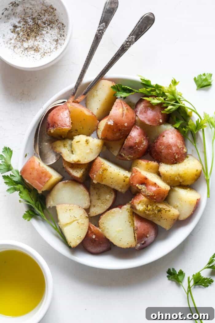 Sous vide baby potatoes, perfectly cooked and served on a plate