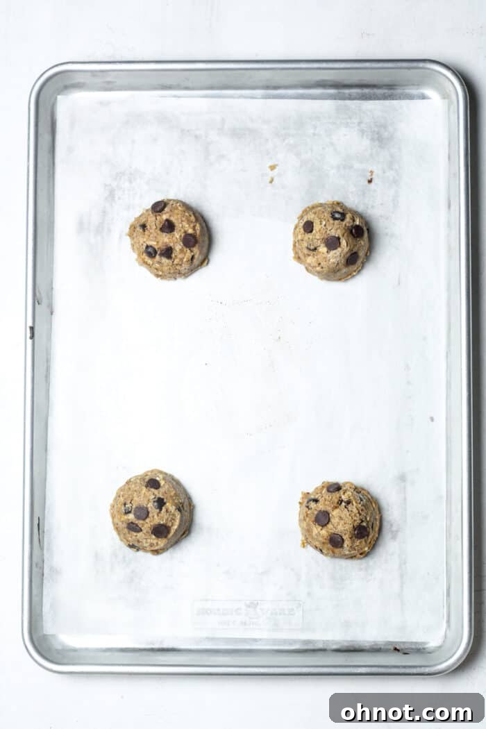 Large baking pan with scoops of dough