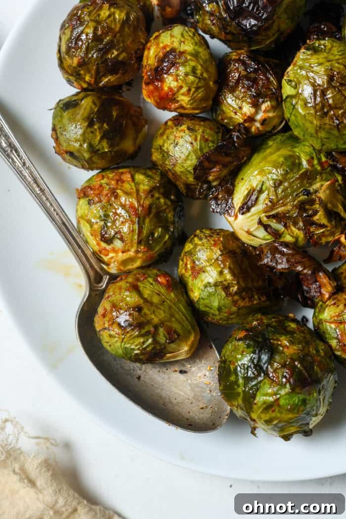 Asian Brussels sprouts on white plate, ready to be served
