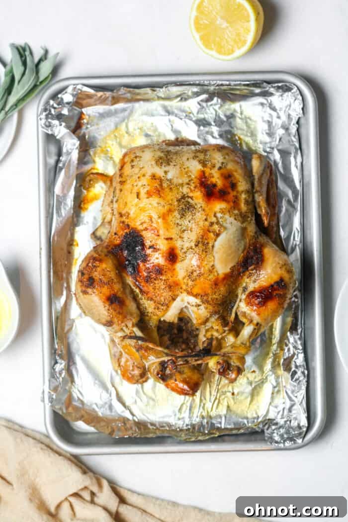Instant Pot whole chicken on a baking pan after broiling