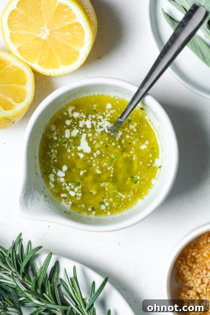 Bowl of melted butter mixed with spices