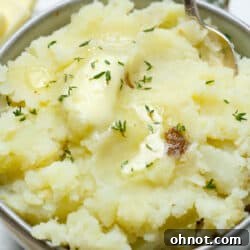 Dairy free mashed potatoes in bowl with dairy free butter