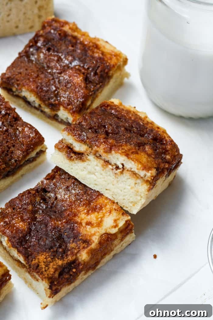 A slice of gluten-free and vegan coffee cake, showcasing its moist texture and cinnamon swirl, ready to be enjoyed.