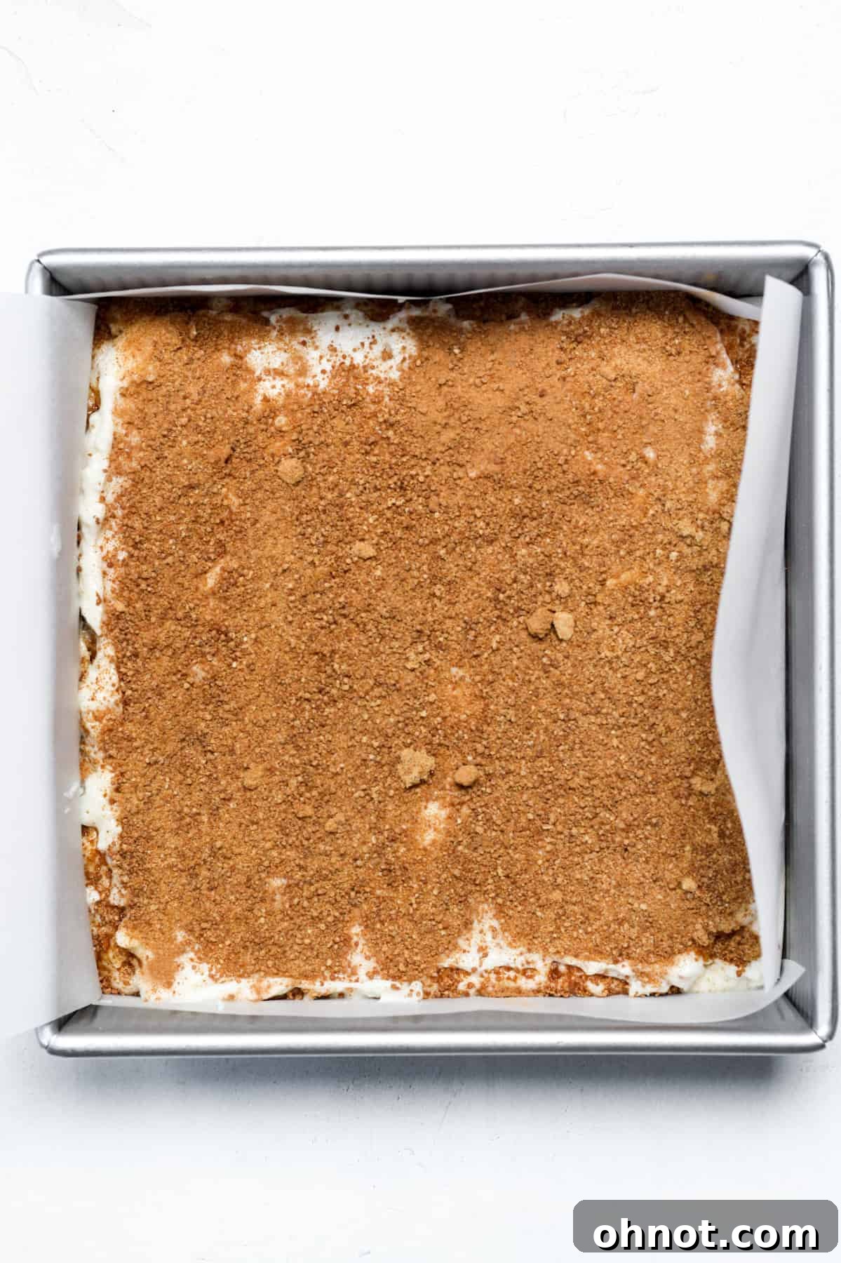 Close-up of the layers in the vegan cinnamon coffee cake before baking, showcasing the beautiful swirl.