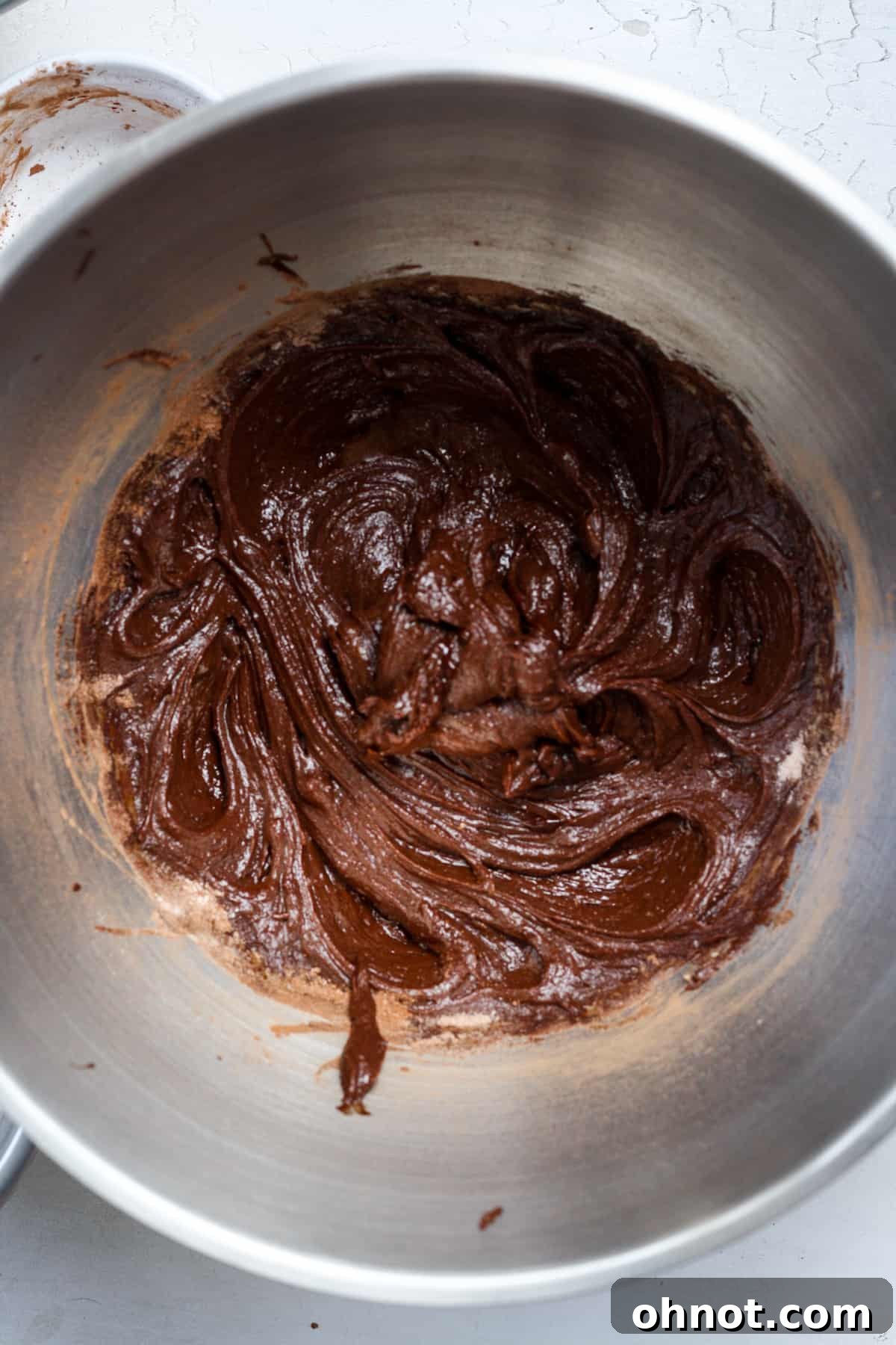 Thick, rich gluten-free brownie batter in the mixing bowl