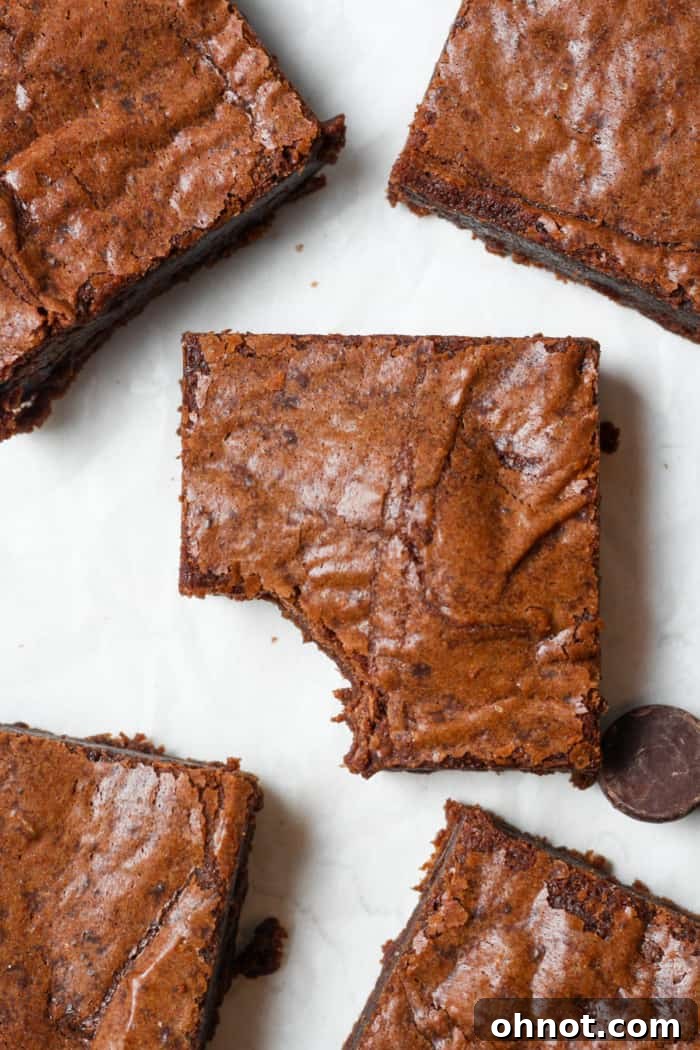A perfectly sliced and presented gluten-free brownie, showcasing its rich texture