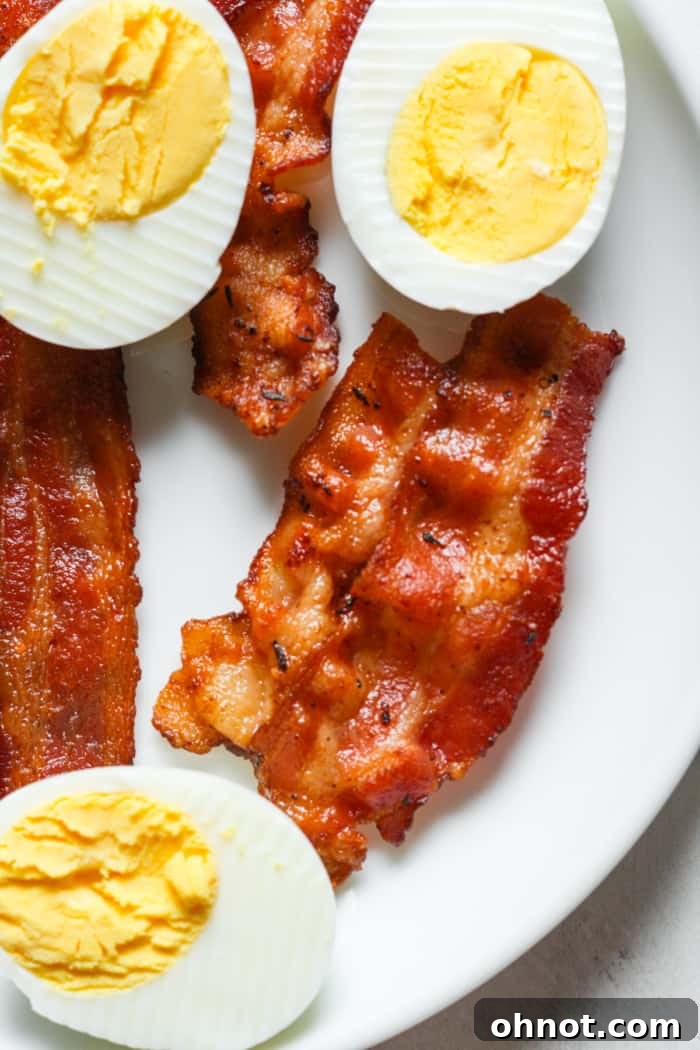 Microwave hard boiled eggs and bacon on plate
