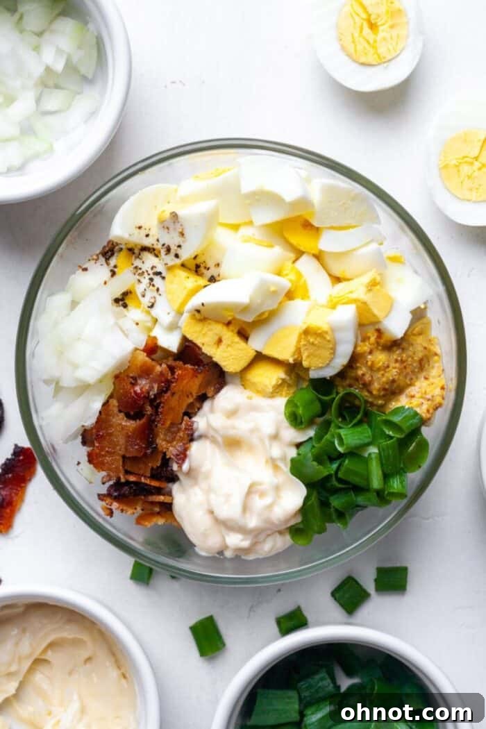 Eggs with veggies in glass bowl