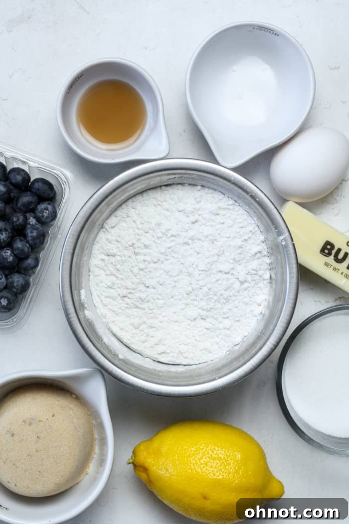 Various baking ingredients in small bowls, including fruit, flour, and sugar