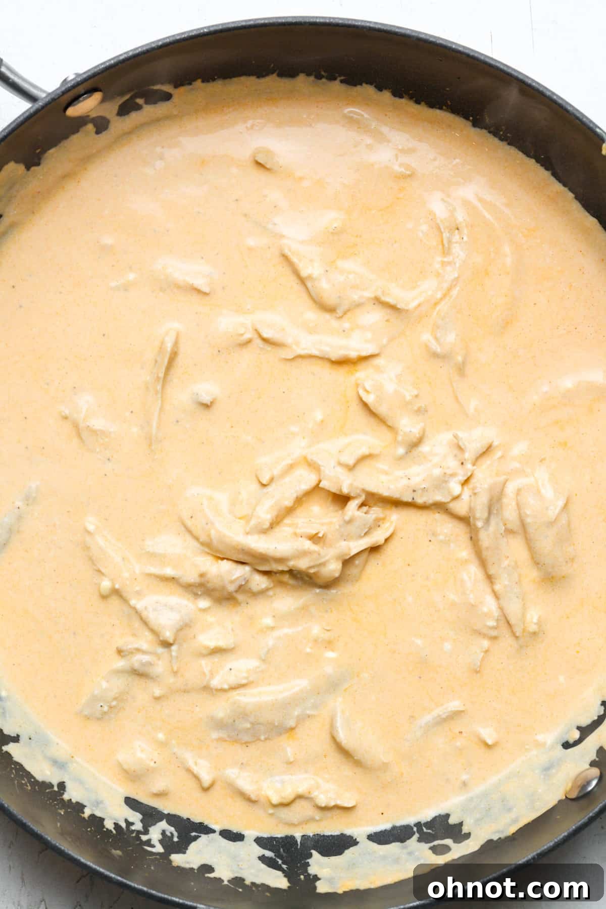 Orange chicken sauce in pan